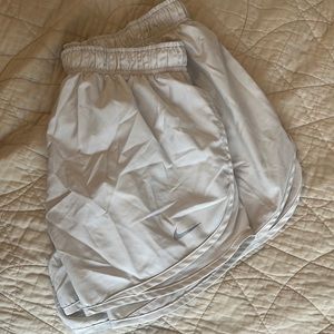 White Nike woman’s running shorts